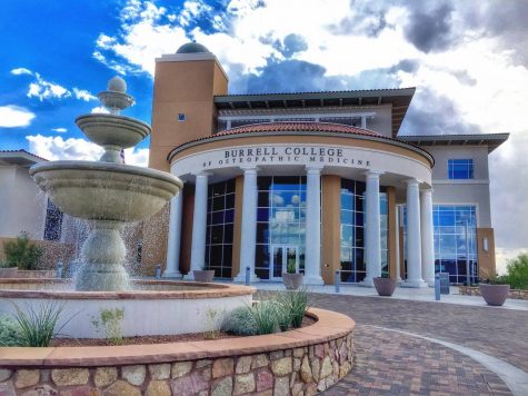 An outside view by the courtyard fountain of the Burrell College of Osteopathic Medicine.
Photo Credit: Luis