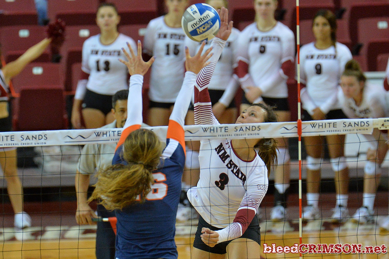 October 5, 2016; New Mexico State outside hitter Jordan Abalos (3) takes a swing over UTEP setter Lindsey Larson (16) in a match between the New Mexico State Aggies and UTEP Miners at the Pan American Center in Las Cruces, N.M. The Aggies defeated the Miners 3-0.