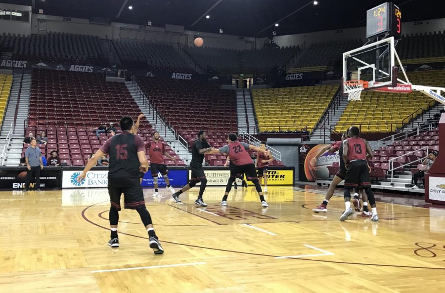 Team black puts up a shot during Saturdays intrasquad scrimmage at the Pan Am. 