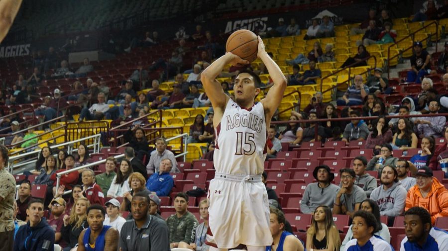 #15 Joe Garza shooting the ball from the 3-point line.