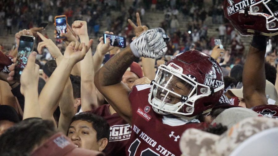 The New Mexico State crowd celebrates with the team as the Aggies become bowl eligible for the first time in 57 years.