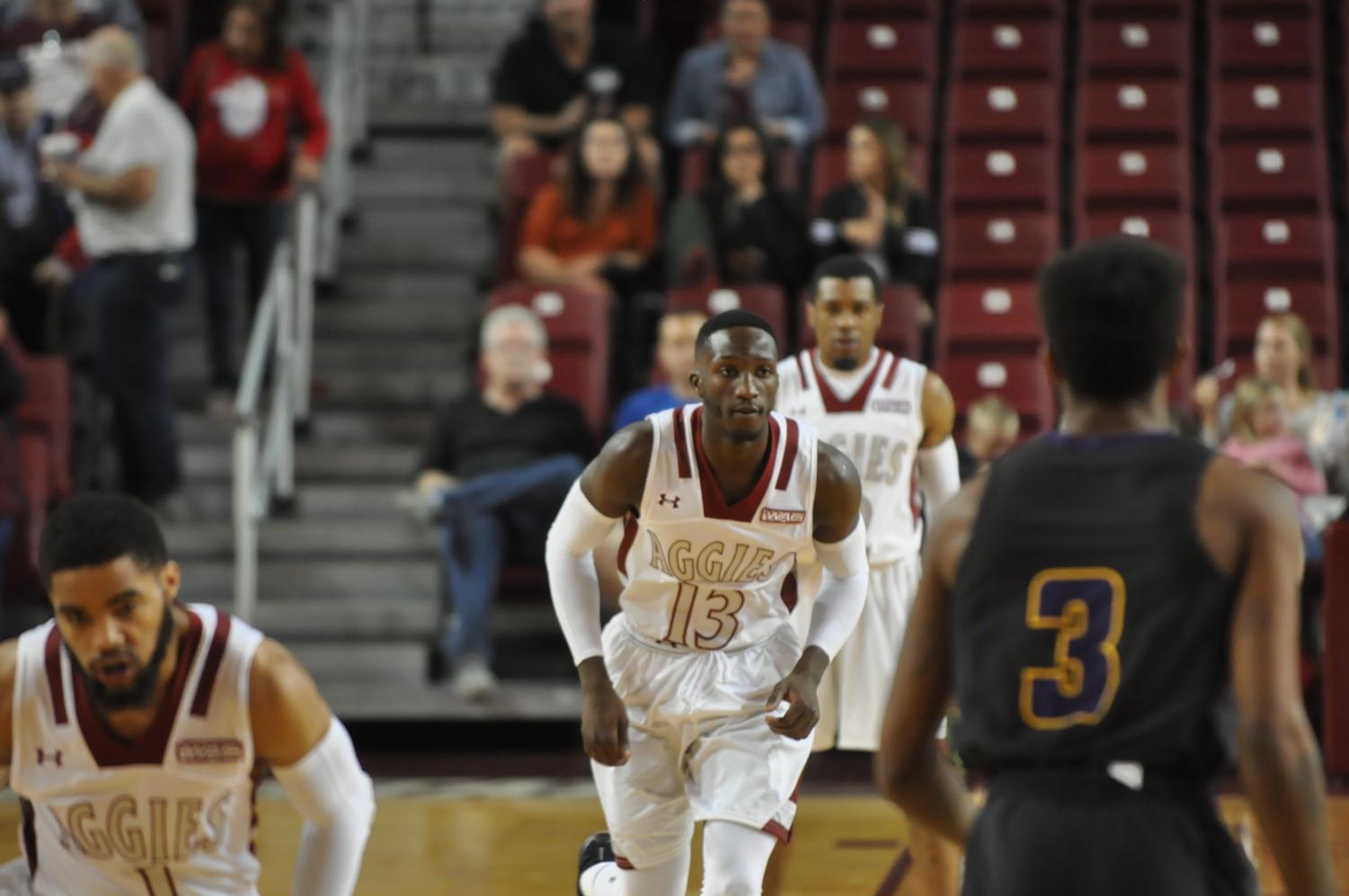 NMSU junior guard Sidy N'Dir looks to play some defense Sunday evening in the Pan American Center. The Aggies Defeated the Panthers 69-57 and improved to 6-1.