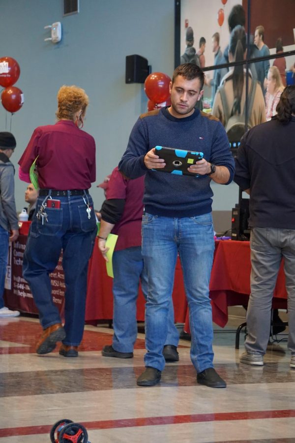 A student driving the RC drone