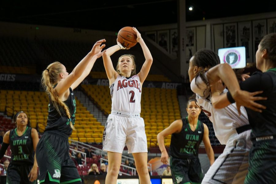 Brooke Salas sinks a shot surrounded by the Utah Valley defense