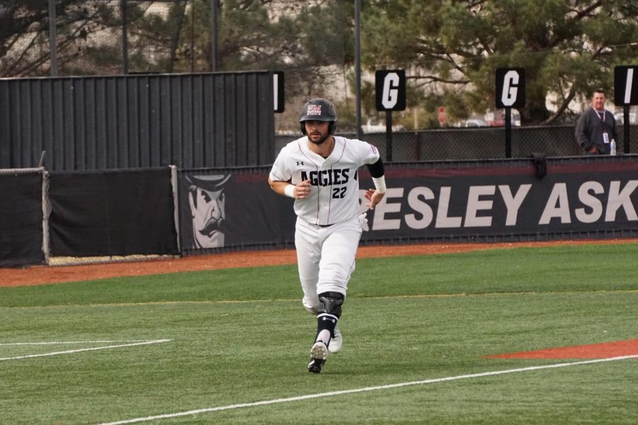 Junior first baseman Caleb Henderson makes his way to the plate as the Aggies defeated Maine 8-5 in the series finale. 