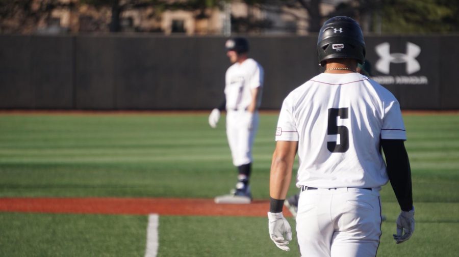 Junior outfielder Tristen Carranza takes a lead Friday evening at the Skew as his team set a new program record for most runs in a single-game; NMSU defeated MVSU 39-0.