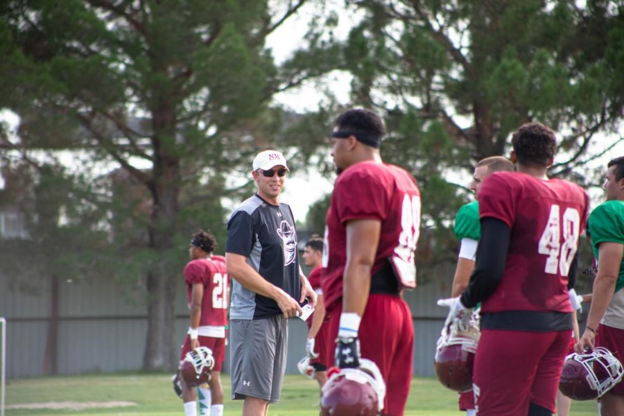 Quarterback coaching staff Chase Holbrook during practice