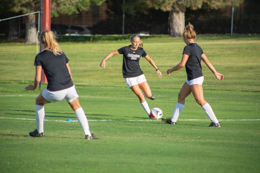 New Mexico State University Women's Soccer doing drills during practice