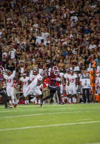 Jason Huntley bursts into the open field in last year's Battle of I-25.