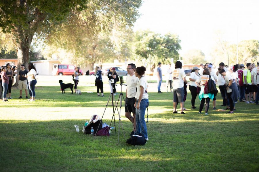 ASNMSU staff taking photos of participants at the event