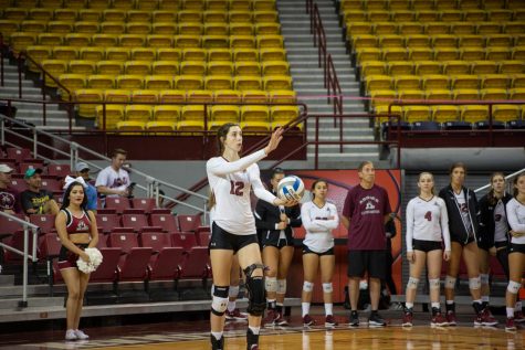 Redshirt-senior Megan Hart serves for the Aggies.