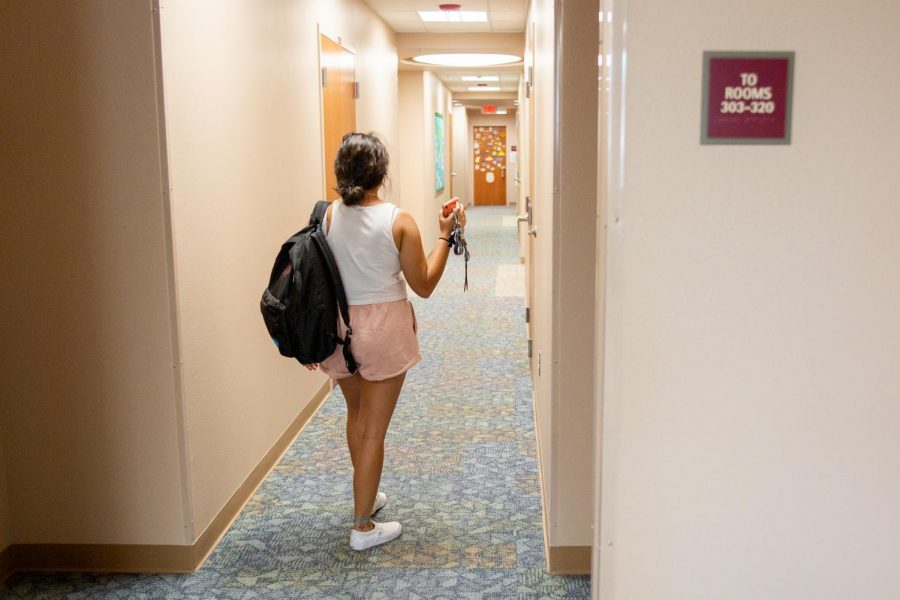 An NMSU student walks in the halls of new residence center, Juniper Hall on Aug. 19.