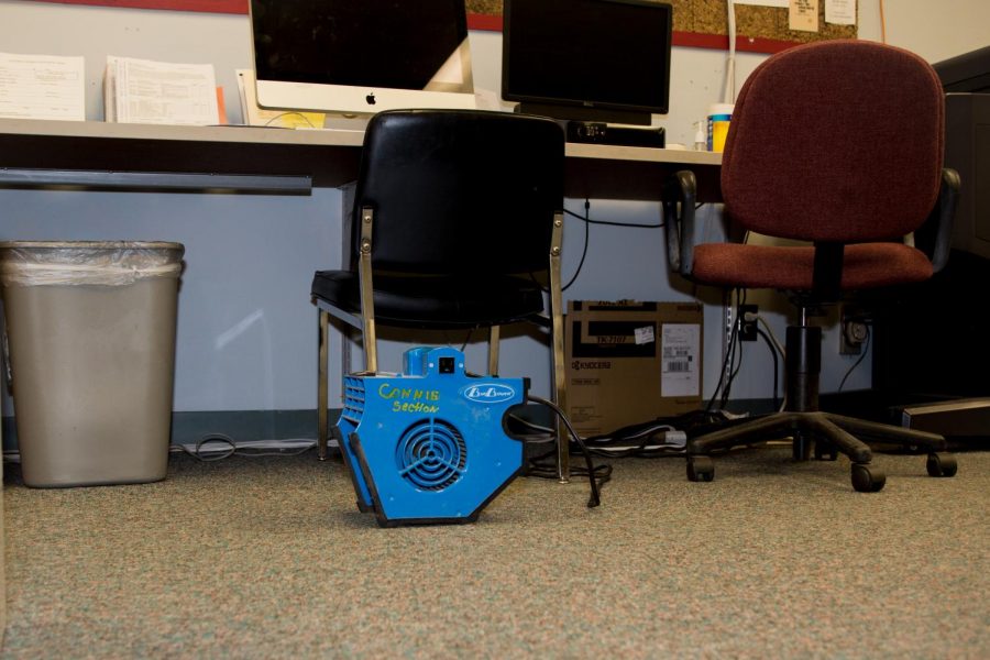 Floor fans dry out the floors in Milton offices and classrooms due to the leakage that occurred. 