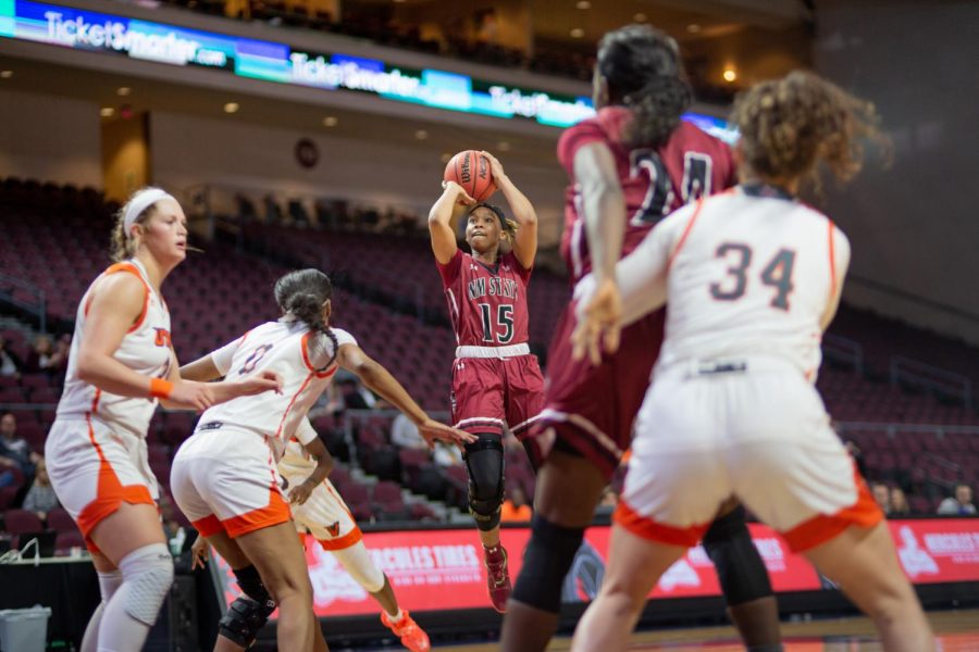 Rodrea Echols pulls up on the UTRGV defense to bury a mid-range jumper in NM State's 73-61 win.