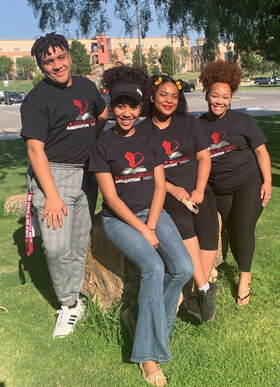 Members of the Black Student Associated are pictured outside of the Corbett Center Student Union. Image courtesy of Run for Humanity website. 