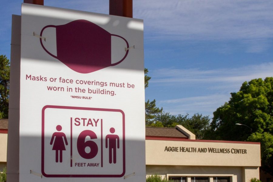 COVID-19+related+signage+on+the+NMSU+campus%2C+near+the+Aggie+Health+and+Wellness+Center+