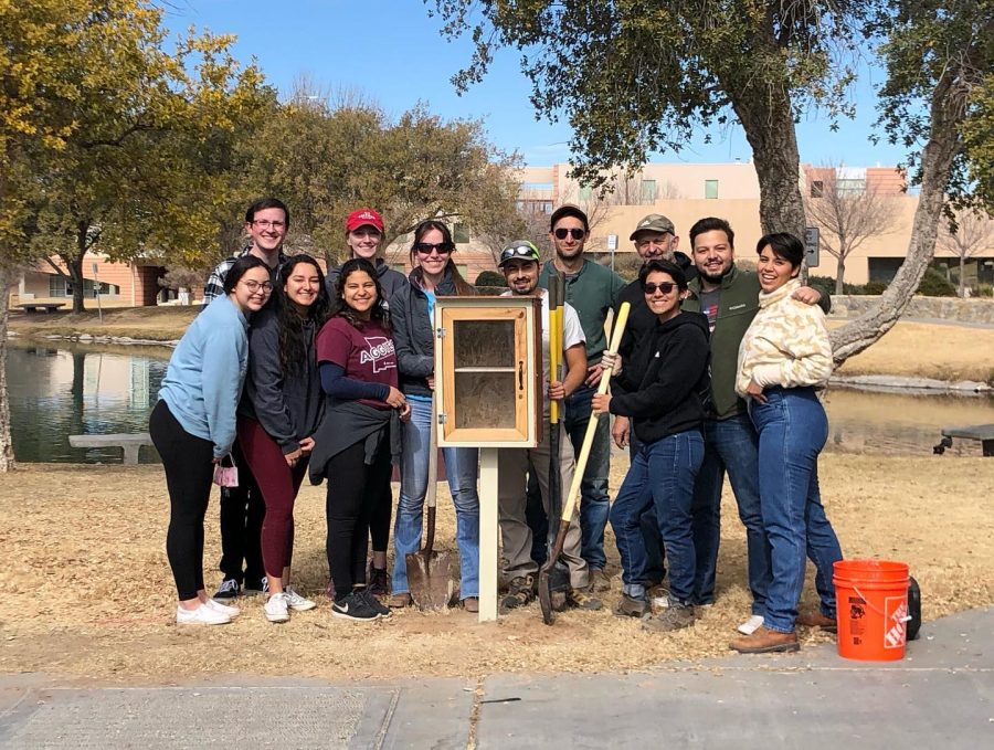 Aggies Without Limits members pose with their Little Library!