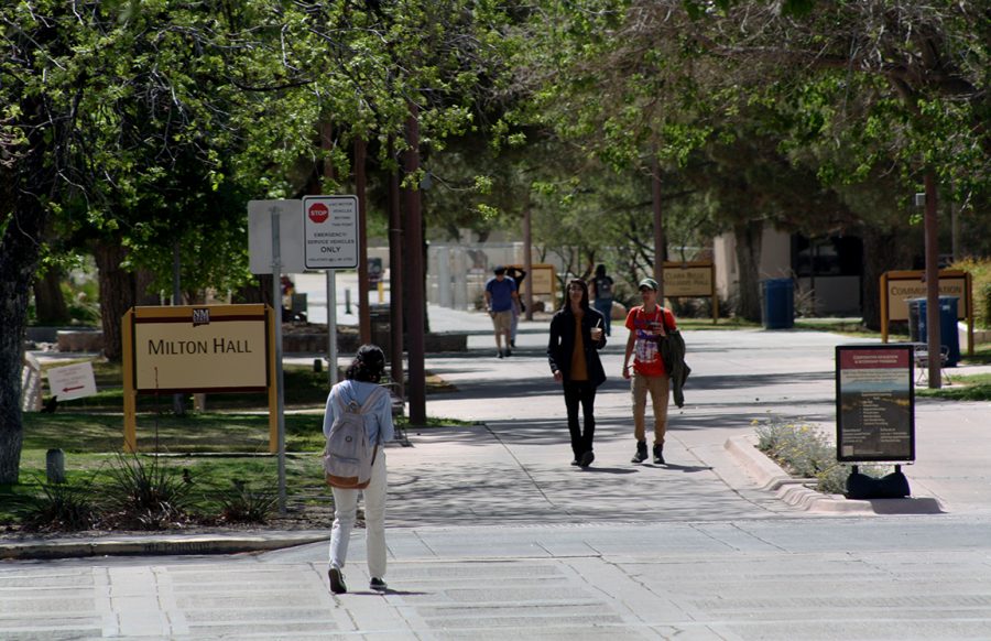 Students walk across the International Mall. Date taken April 20, 2022