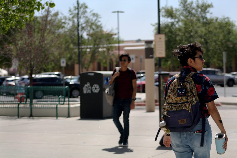Students walk outside Corbett Center Student Union. Date taken April 20, 2022