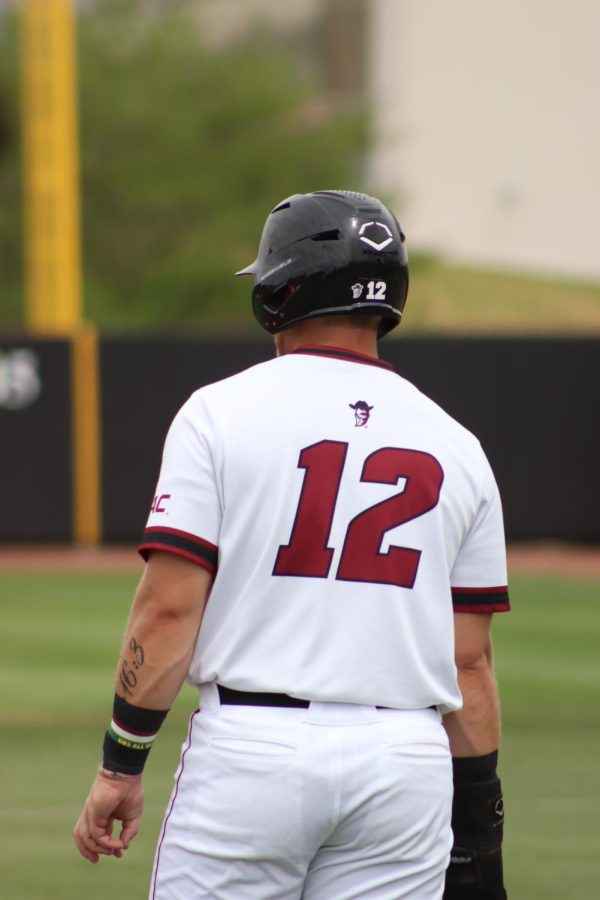 Preston Godfrey, New Mexico State baseball player, is at second base ready to take it home. Taken on April 12.