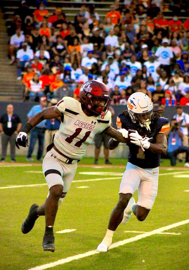 NMSU wide receiver Kordell David prevents UTEP player from getting to the ball Sept.10, 2022.