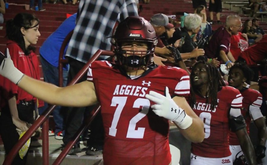 Offensive line Jai Rodriguez gives us a guns up in celebration of the NMSU victory. Sept. 24, 2022. 