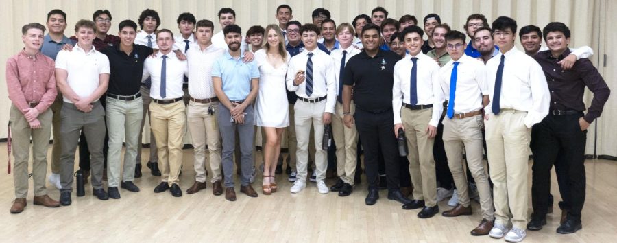 Sigma Chi and Sweetheart of Sigma Chi, Alison Rewalt welcoming the New members to the fraternity. Sept. 28, 2022. 