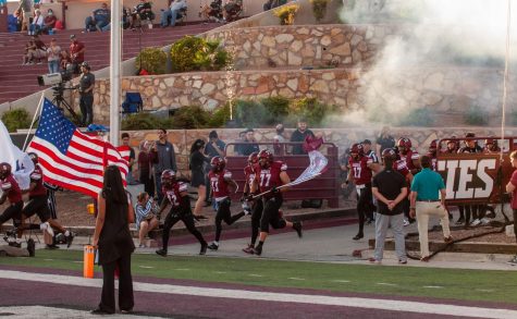 The NMSU football team run out of the tunnel for the start of their game against FIU at Aggie Memorial Stadium on Oct. 1, 2022.