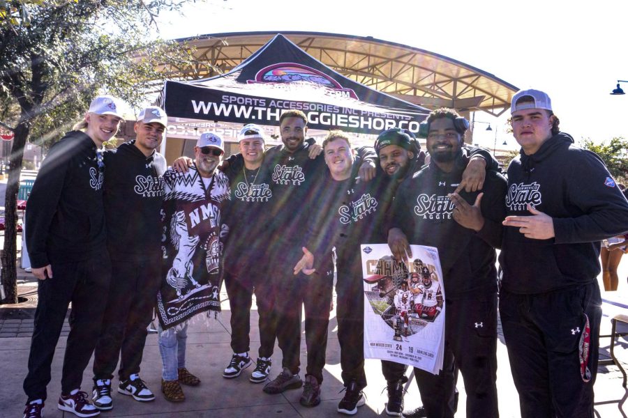 The NMSU football team along with head coach Jerry Kill pose at thier bowl celebration on Saturday Jan. 21, 2023.