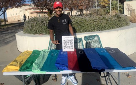 Darin McFadden owner of 7SEVENTEEN selling his apparel outside Corbett Student Union. Photo Taken on Dec. 6, 2022.