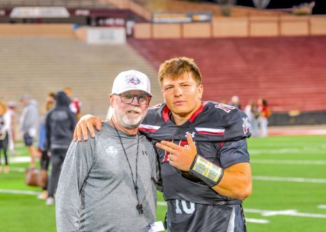 Coach Jerry Kill and Senior Quarterback Diego Pavia pose after the White teams win, Thursday April 20, 2023 at Aggie Memorial Stadium.