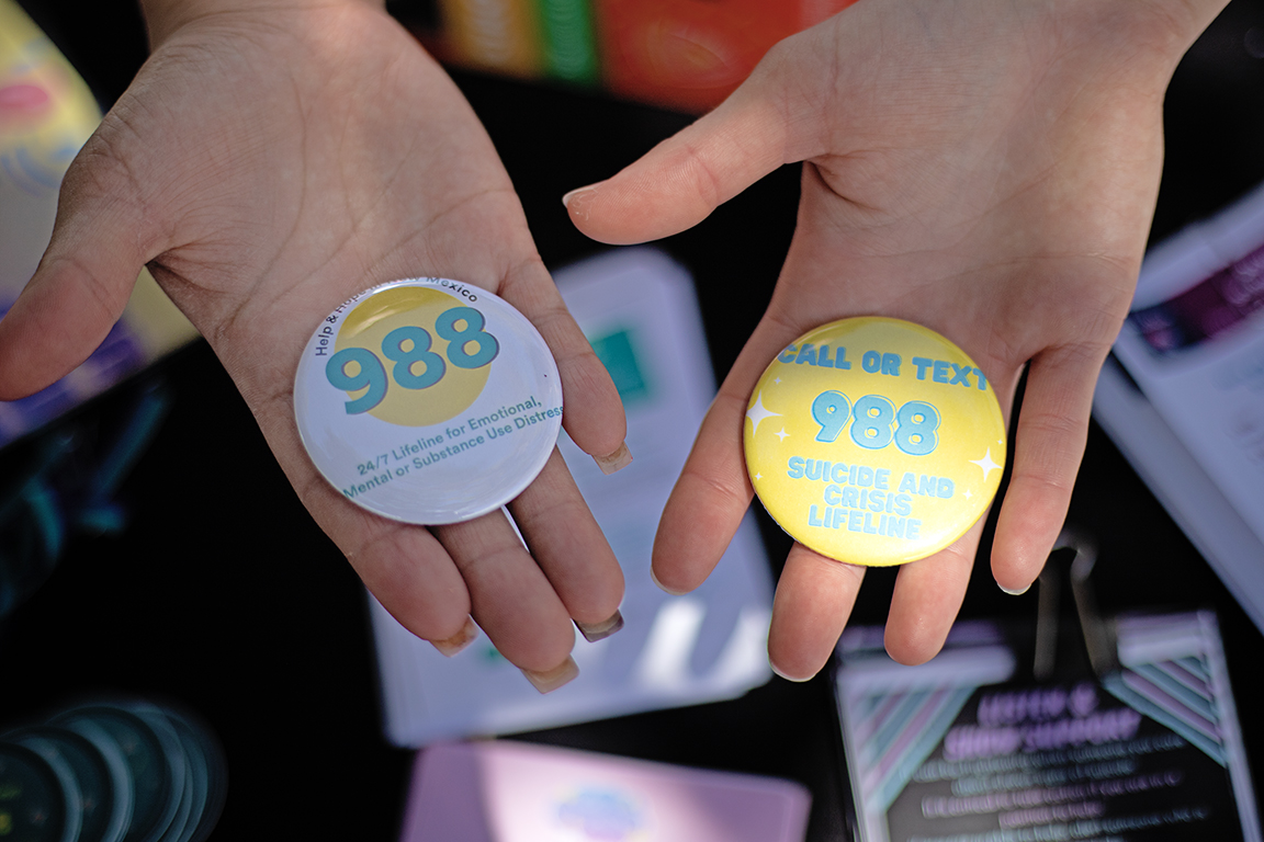 The Office of Health Promotion gave out buttons displaying 988, the Suicide and Crisis Lifeline, for Suicide Prevention Week. Sept. 14, 2023.
