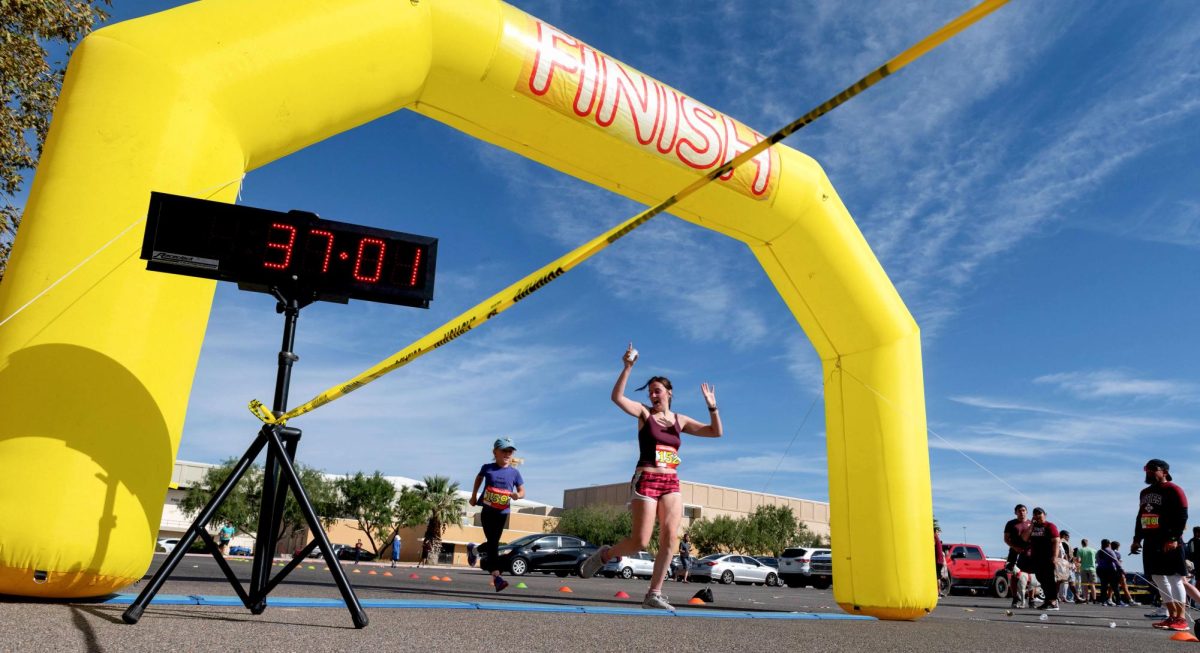 A runner passing the finish line on Oct. 14, 2023, at the Gratitude 5k. (Photo courtesy of Josh Bachman)