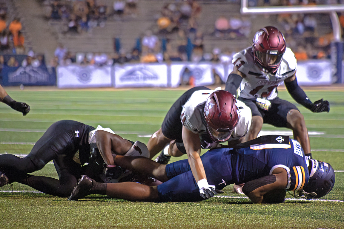 The Aggies tackle a UTEP Miner to the ground. Oct. 18, 2023. 
