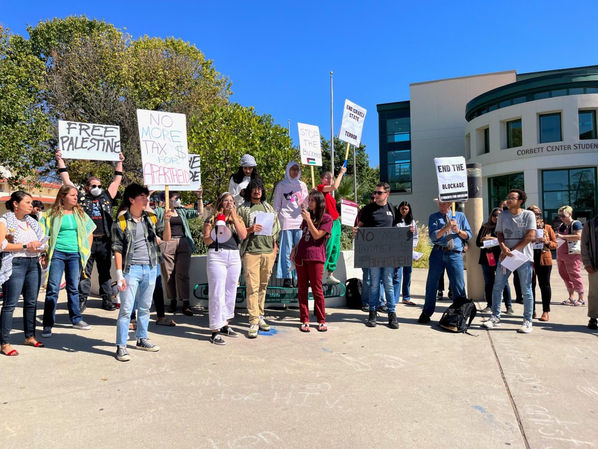 Students for Socialism led the protest outside Corbett Center Student Union. Participants chanted and told personal stories of their families in Palestine. Oct. 17, 2023.