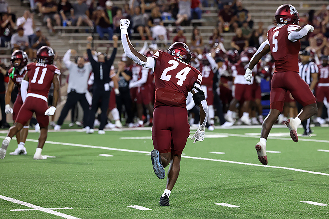 New Mexico State celebrates a successful play at Aggie Memorial Stadium on August 31, 2024, against Southeast Missouri State.