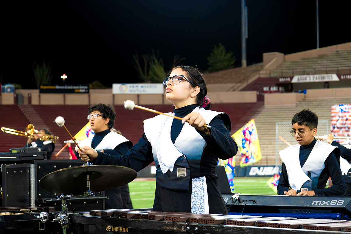 A member of the Bel Air marching band front line actively watches their drum major. Sept. 21, 2024.
