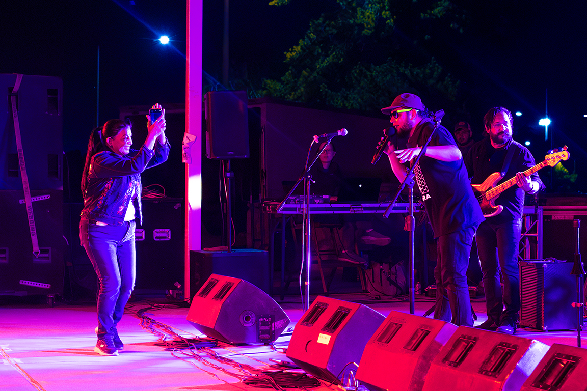 Student Program Coordinator, Claudia Gonzalez Astorga joins Sonido Cachimbo on stage to dance. Oct. 16, 2024. 