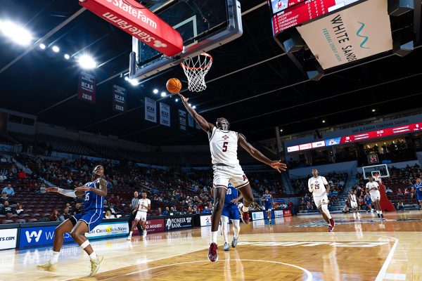 Guard, Carl Cherenfant jumps to score. Nov. 4, 2024. 