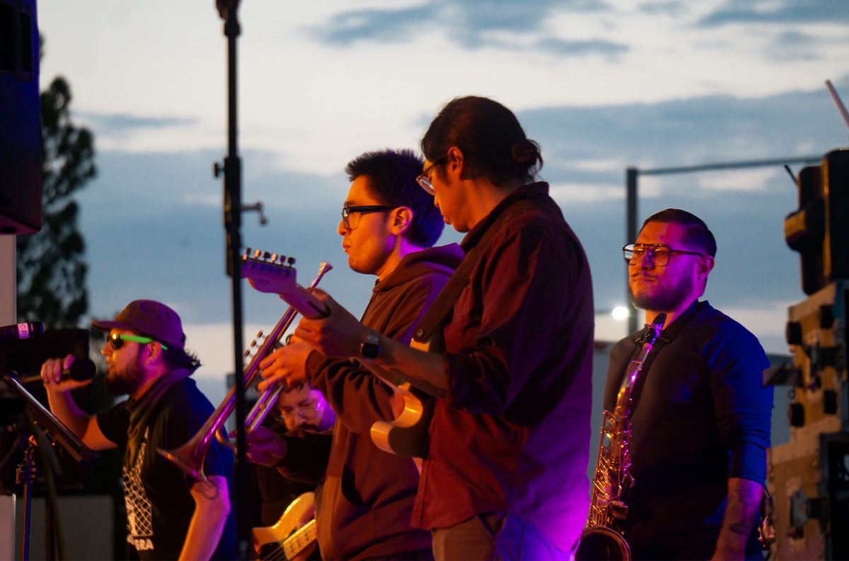 A LACumbia band serenades a crowd of students at the CCSU outdoor stage. Oct. 16, 2024.  