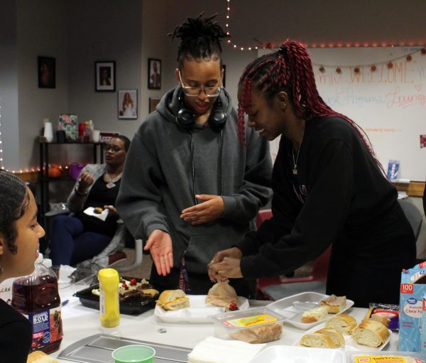 BSA President Lauren Smith and Angel Ennis put together their sandwiches before the discussion night begins. Nov. 13, 2024.