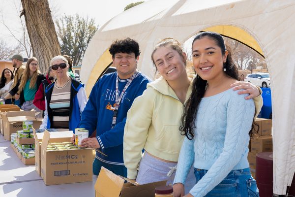 Volunteers wait at their stations before the Pete’s Pantry in the Park event begins on Tuesday, Jan. 28, 2025.