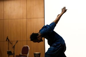 Brahimasory "Soriba" Fofana dances in the Corbett Student Union Auditorium Feb. 22, 2025. 