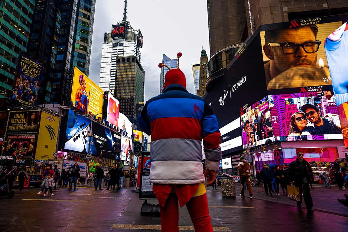 Mascot of Mexican hero “El Chapulin Colorado” stands in the middle of Times Square, New York. Feb. 27, 2025. 
