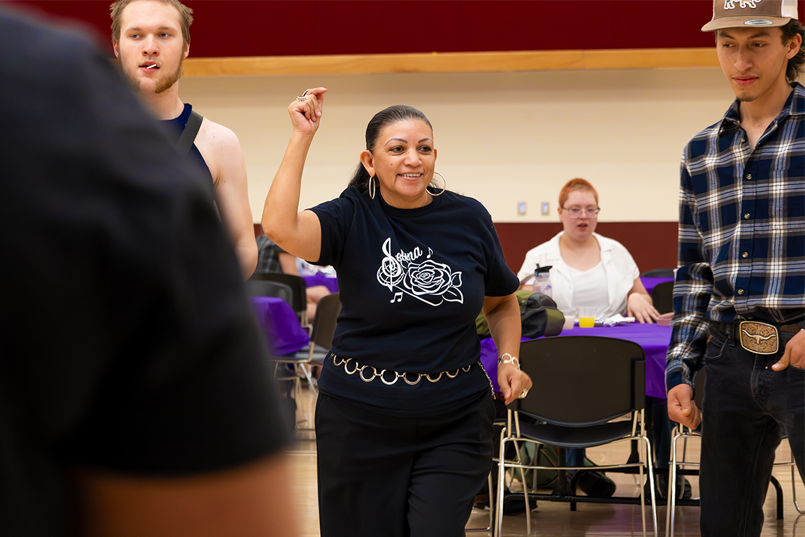 Latin American Programs’ Student Program Coordinator, Claudia Gonzalez Astorga dances alongside NMSU students at the Selena Day event. April 16, 2025.