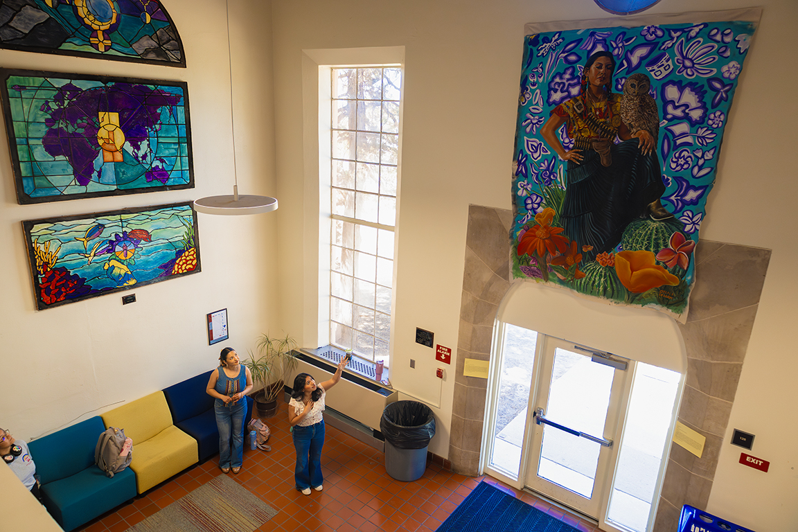 President of the Latin American Student Council, Karla Robles-Guzman (right) talks about what it’s like to be the model for a mural. Robles-Guzman was artist Citlali Delgado’s inspiration for “Ni Una Mas.” April 22, 2025. 
