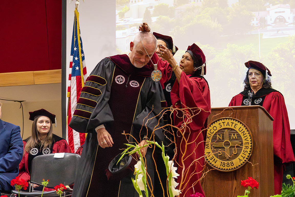 Valerio Ferme is presented with a medallion given to newly appointed presidents at NMSU. April 24, 2025.