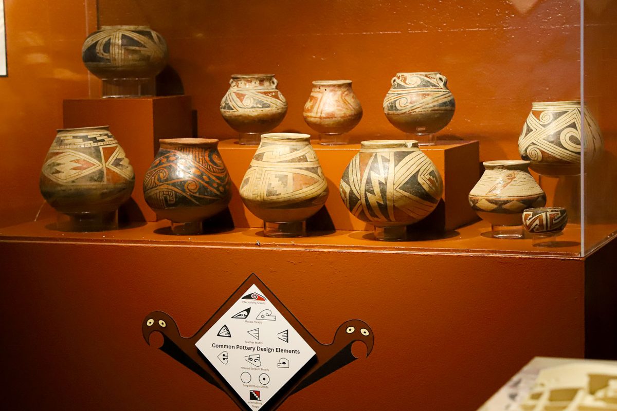 A selection of ceramic pots showcasing common Pueblo design elements is displayed at the exhibit. Apr. 17, 2025.