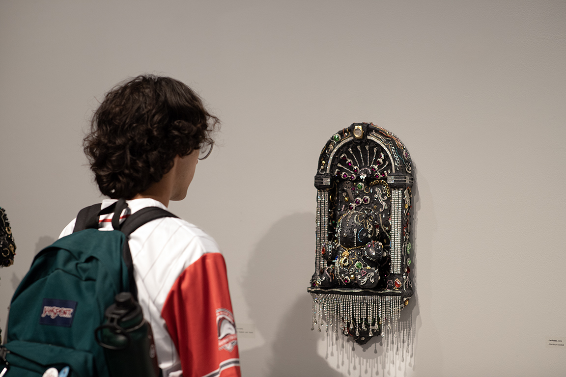 Guest taking a closer look at artwork. Sep.19, 2025 