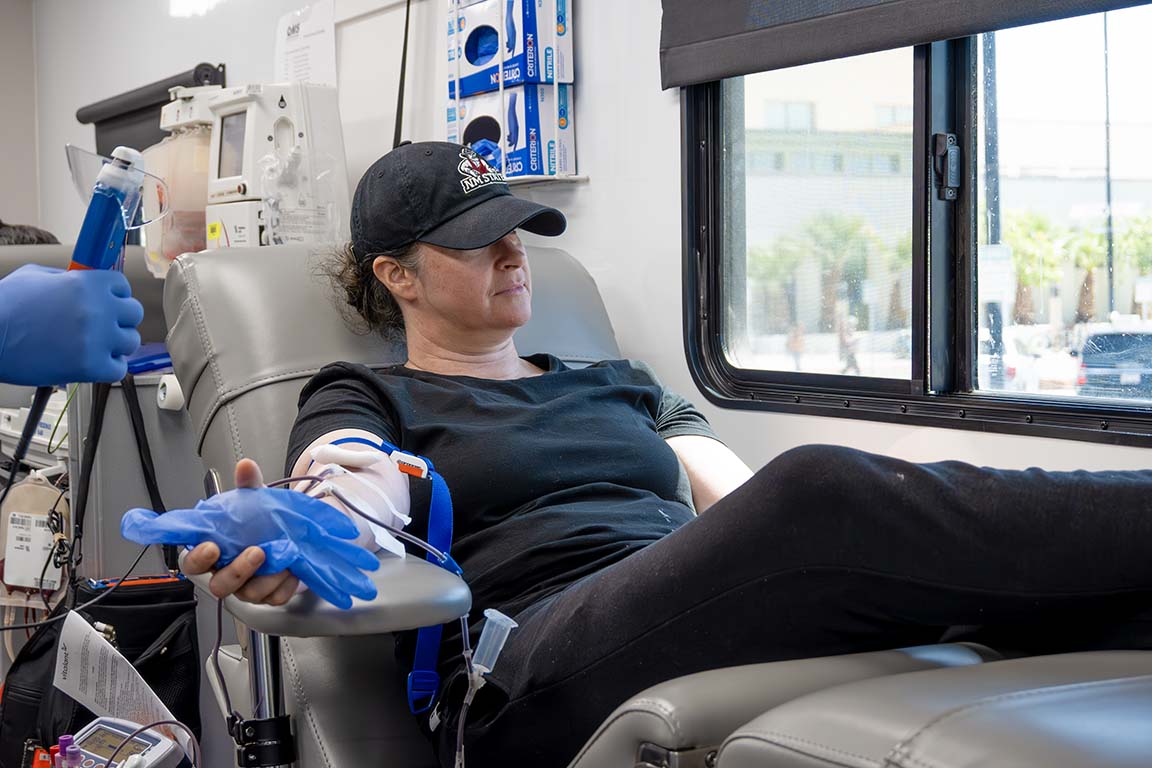 Blood Drive participant squeezes a glove to speed up the blood donation process. Sept. 11, 2025.  